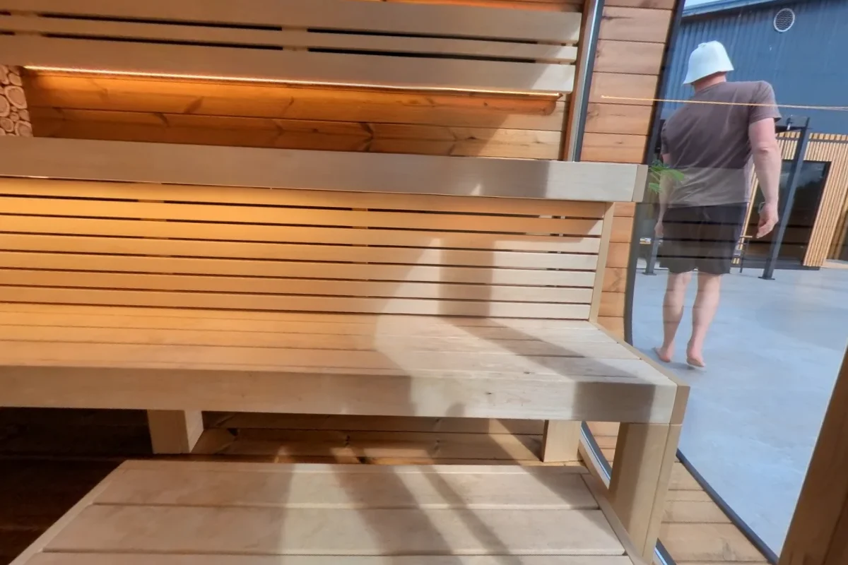 The lower bench and entry step in front of the Round Cube upper seat.