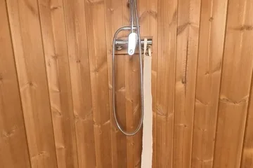 SaunaLife R3 Barrel Shower, inside the shower: Explore the timber enclosure, shower fixture and floor.