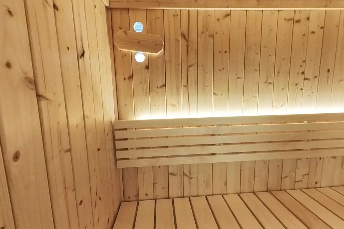 Backrest lighting washes the X6 wood wall.