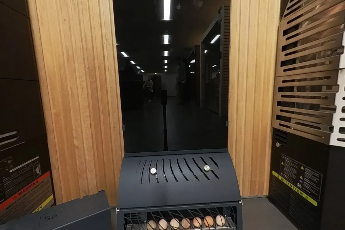 Saunum air-column display with its lower housing and tray.