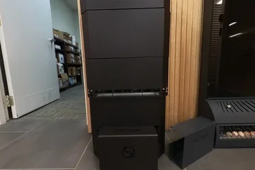 Saunum Heater display, closed basket: The closed-basket heater from the showroom floor.