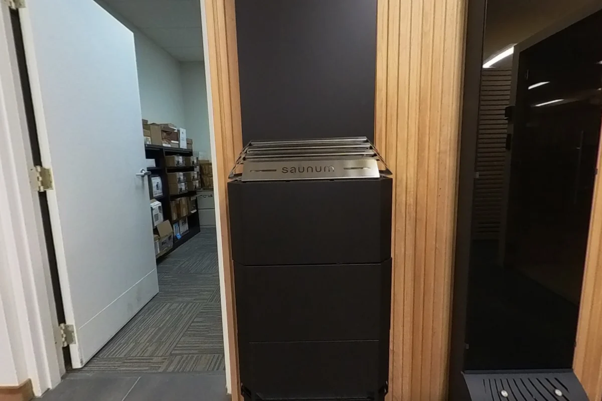 Covered-front Saunum unit viewed from the side.