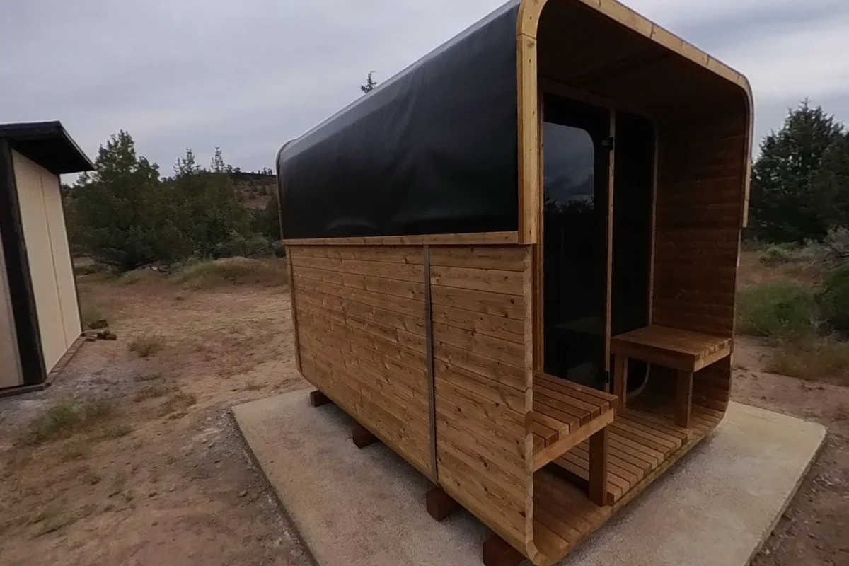 The open Square #40 porch is outside the enclosed sauna.